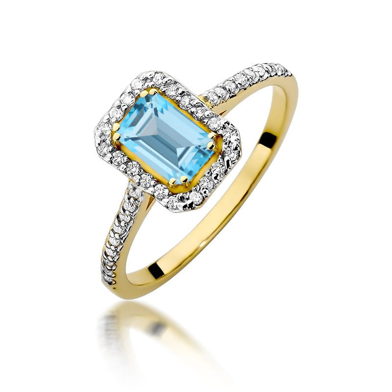 Pierścionek Topaz Swiss 0,65ct żółte złoto